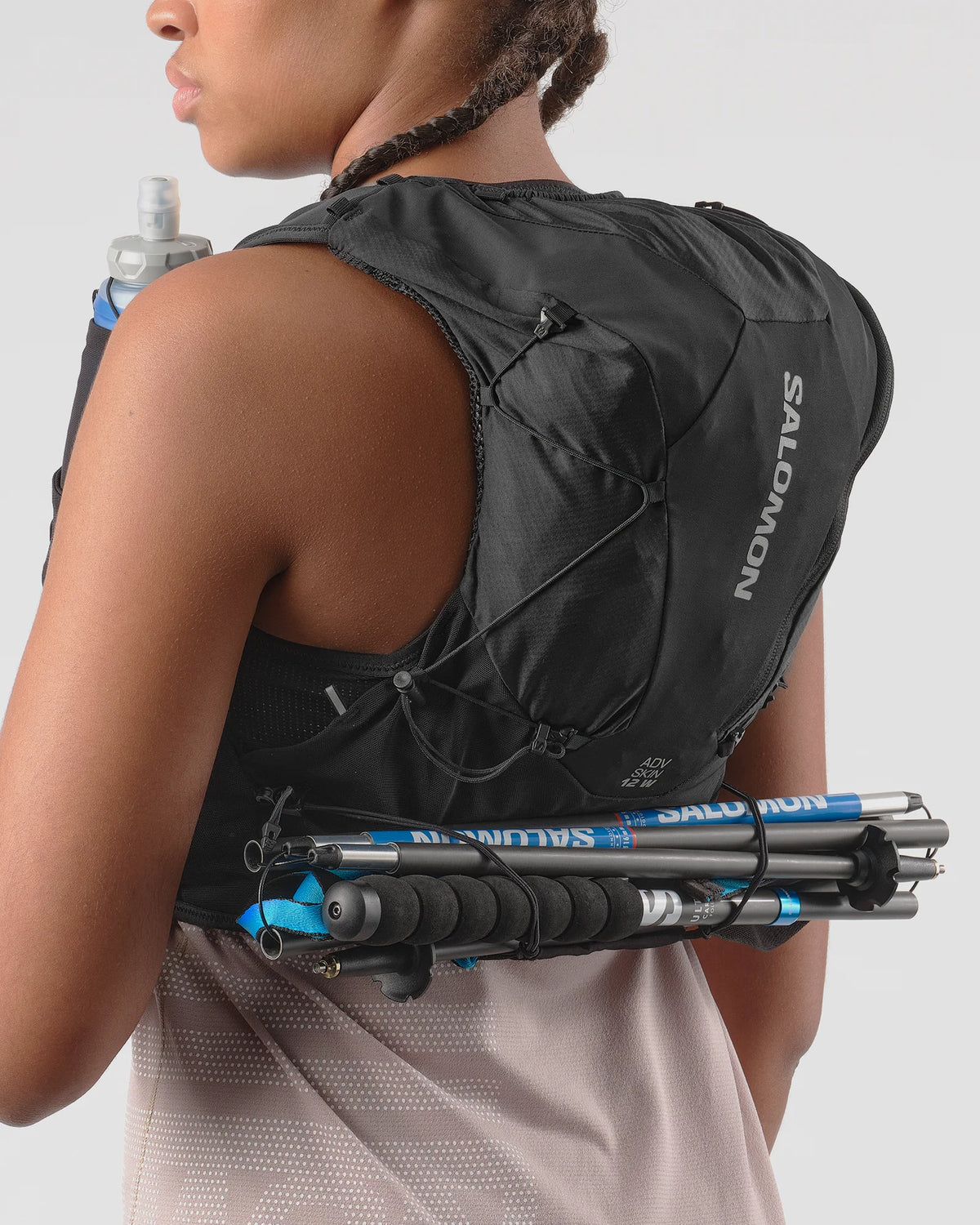 Salomon ADV Skin 12 Damen in Schwarz, Stocktransport am Rücken