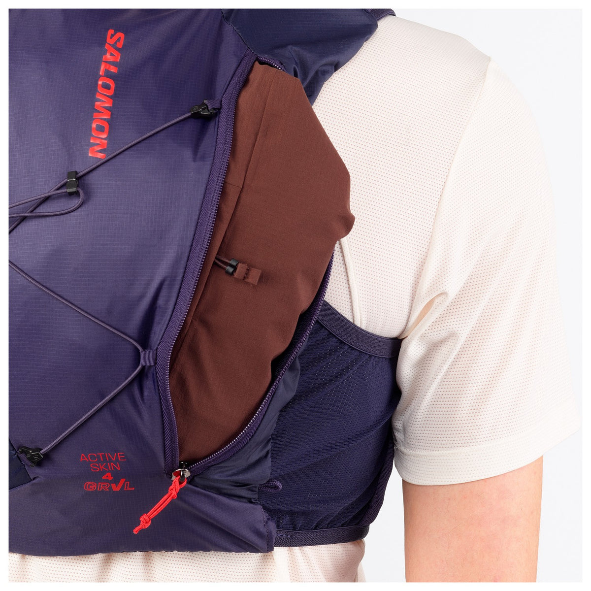 Salomon Active Skin 4 GRVL Violett Trinkweste, Detail des Rückenfachs